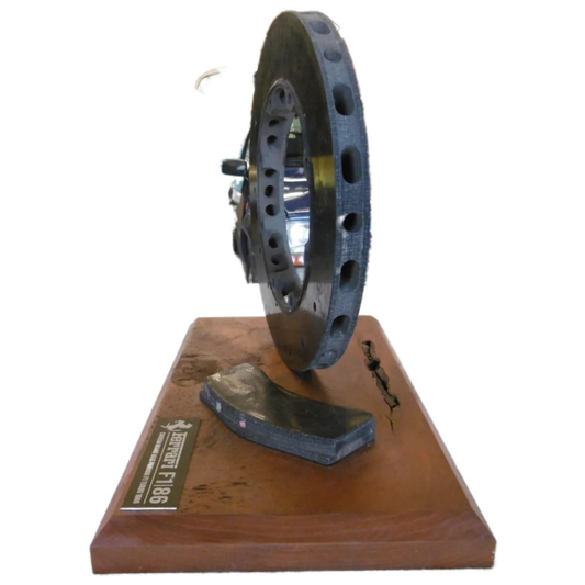 FerrariFormula11986BrakeDisc_PadonWoodenDisplayStand_side