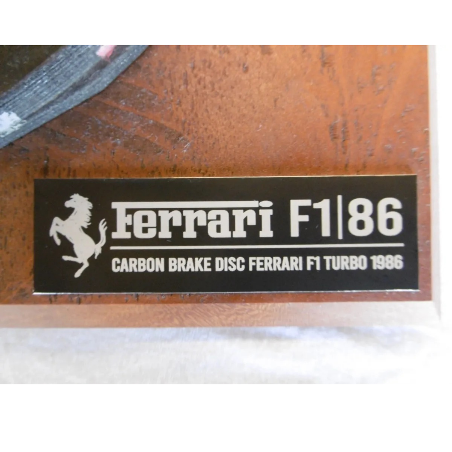 FerrariFormula11986BrakeDisc_PadonWoodenDisplayStand_label